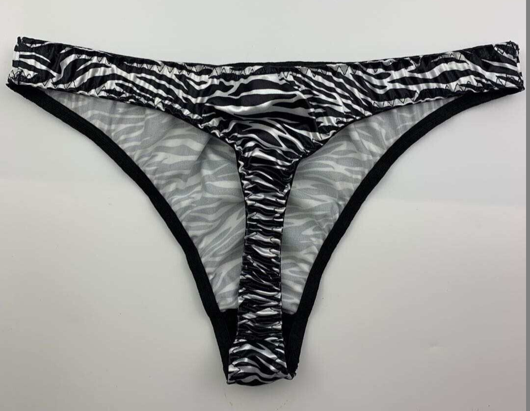 SEXY ANIMAL PRINT THONG PANTIES SIZE LARGE 90% POLYESTER 10% SPANDEX NEW