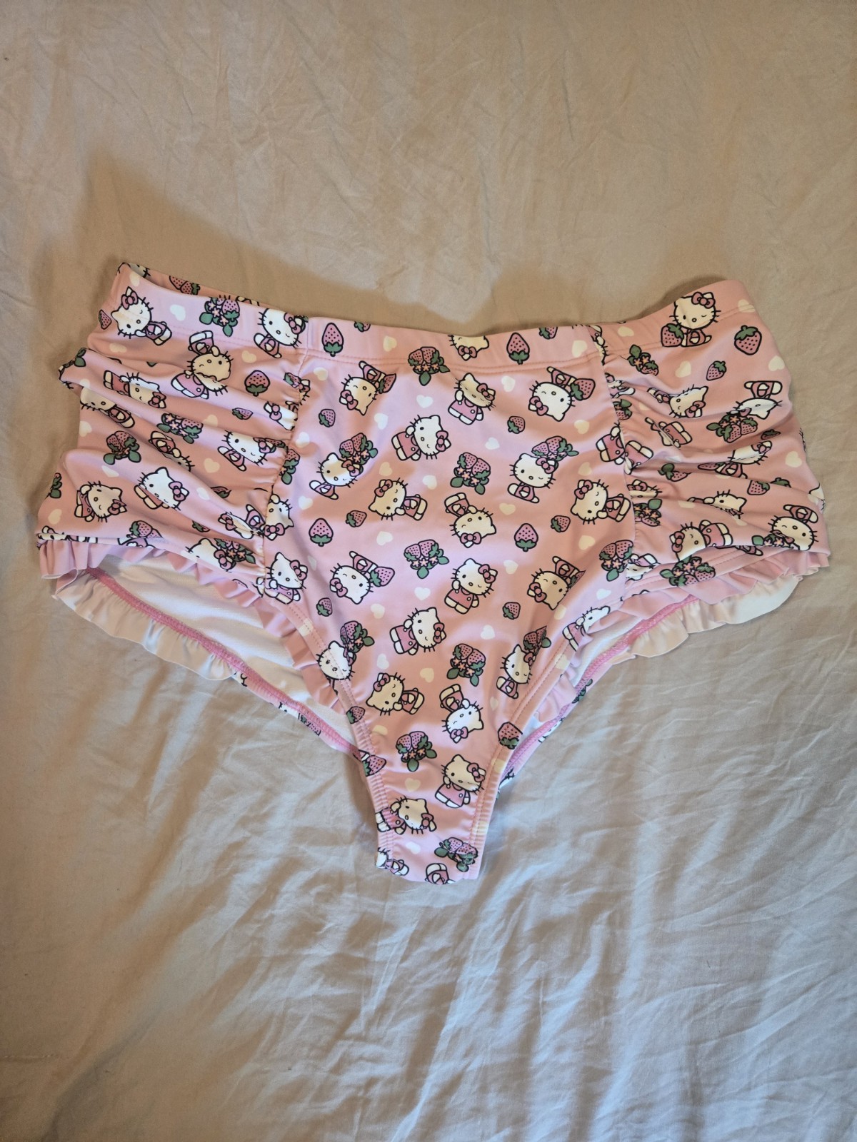 Hello Kitty & Sanrio Women’s Pink Ruffle Hipster Swim Bottoms M Stretch