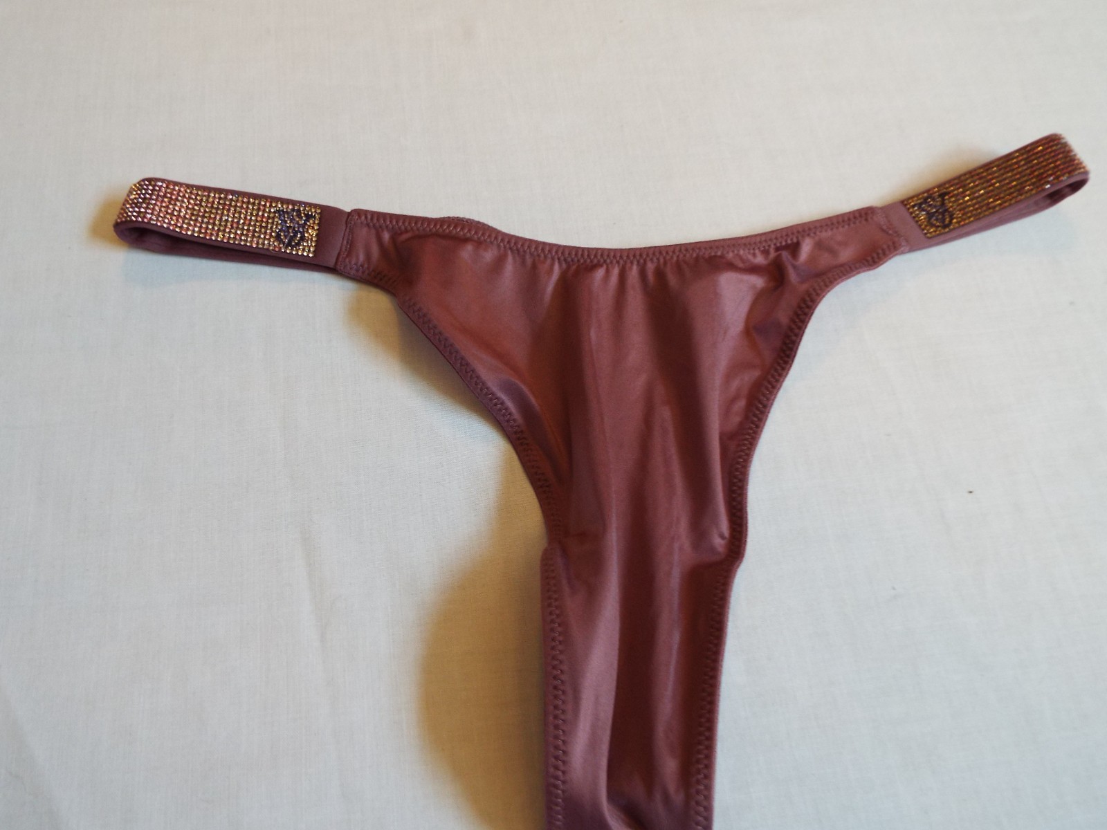 NWT Victorias Secret Sexy Shine Strap Smooth Thong rhinestone Purple Vapor L