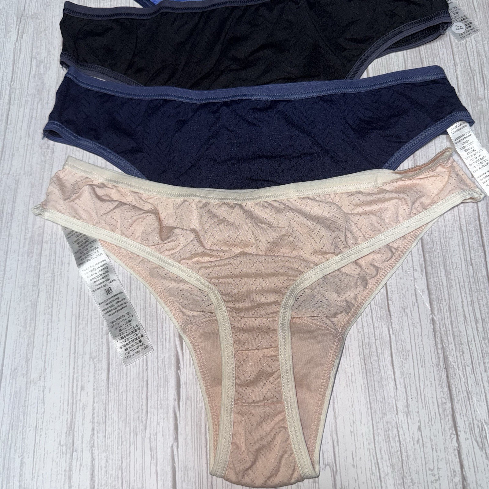 Hanky Panky Women’s MoveCalm™ Natural Rise Thongs in a 4-pack assortment
