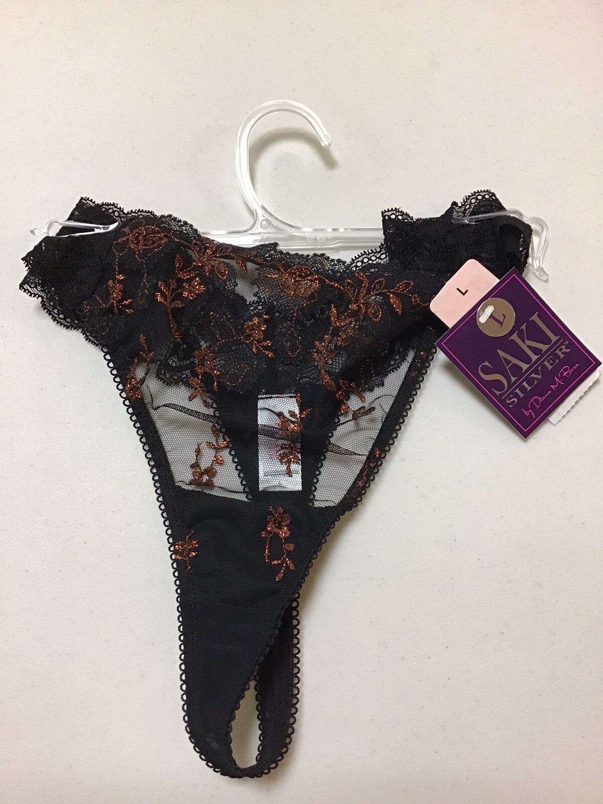 WOMENS PANTY SAKI SILVER STRING THONG BLACK LACE WITH BRONZE COLOR DESIGN