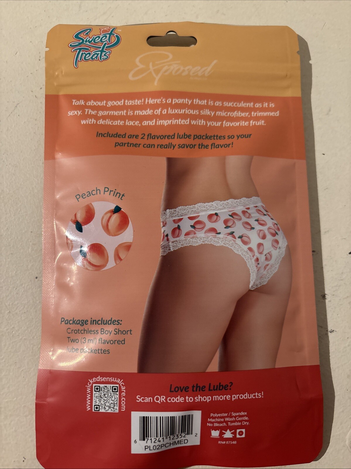 SWEET TREATS SPLIT BACK CROTCHLESS PANTY WITH EDIBLE LUBE PEACH